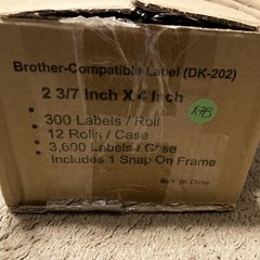 2 3/7”x 4” labels 12 rolls 300 Labels Each Roll DK-202 Includes 1 Snap On Frame