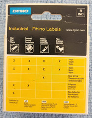 DYMO Rhino Industrial Flexible Nylon Tape 1″ x 11-1/2′ Black on White — 1734524